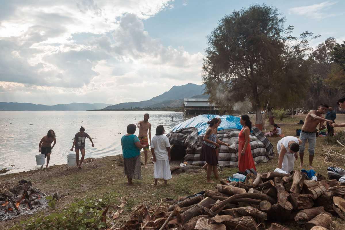 People prepare for a temazcal ceremony on the Lake Chapala shore just east of the malecón.