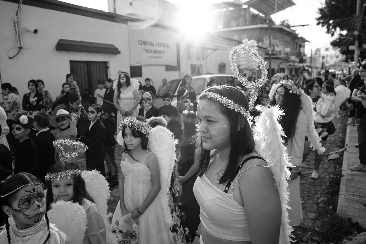 Children walk in the 2023 parade in Ajijic on November 1 for the Day of the Little Angels when deceased children are remembered.