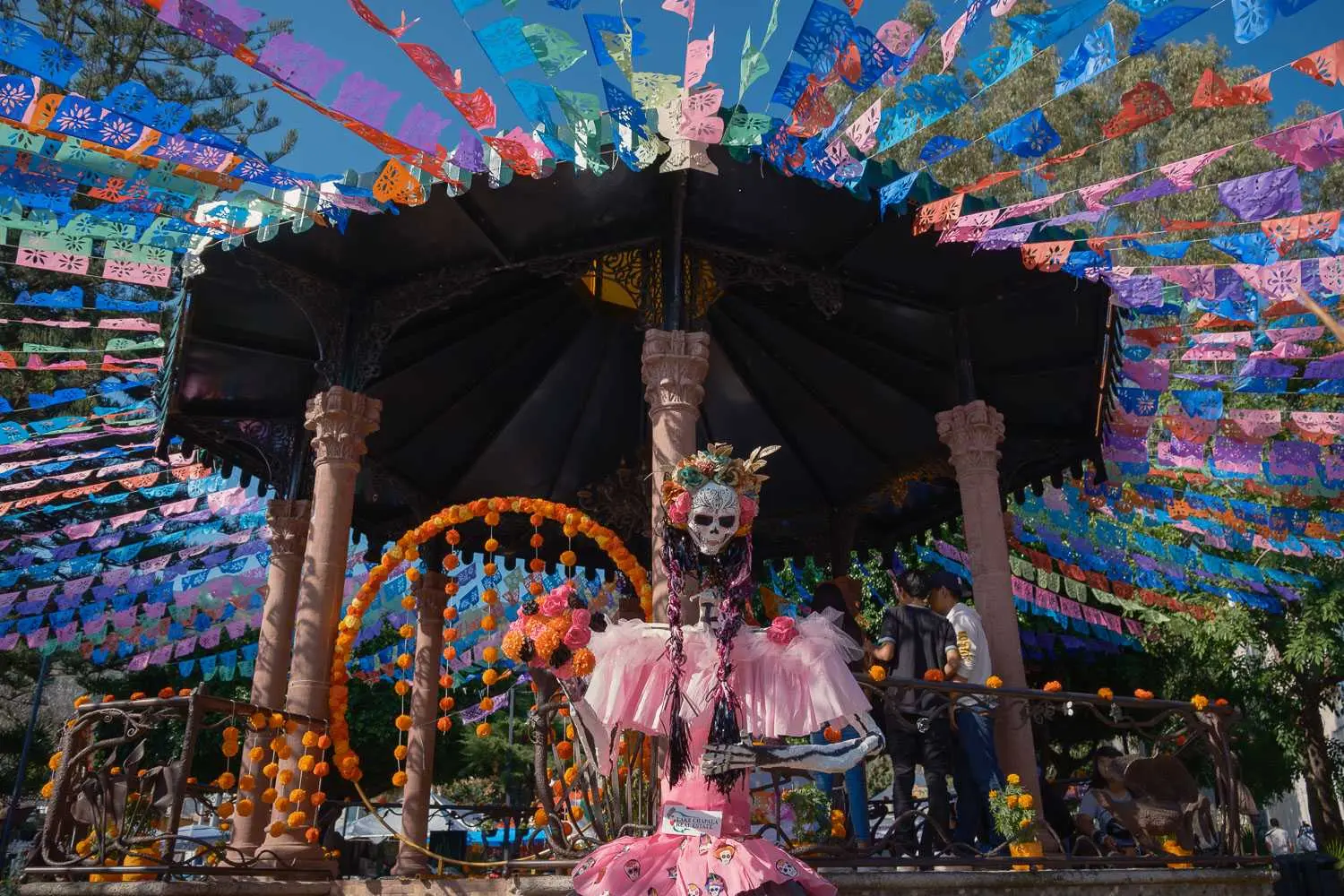 The central kiosk in the plaza decorated for the Day of the Dead.