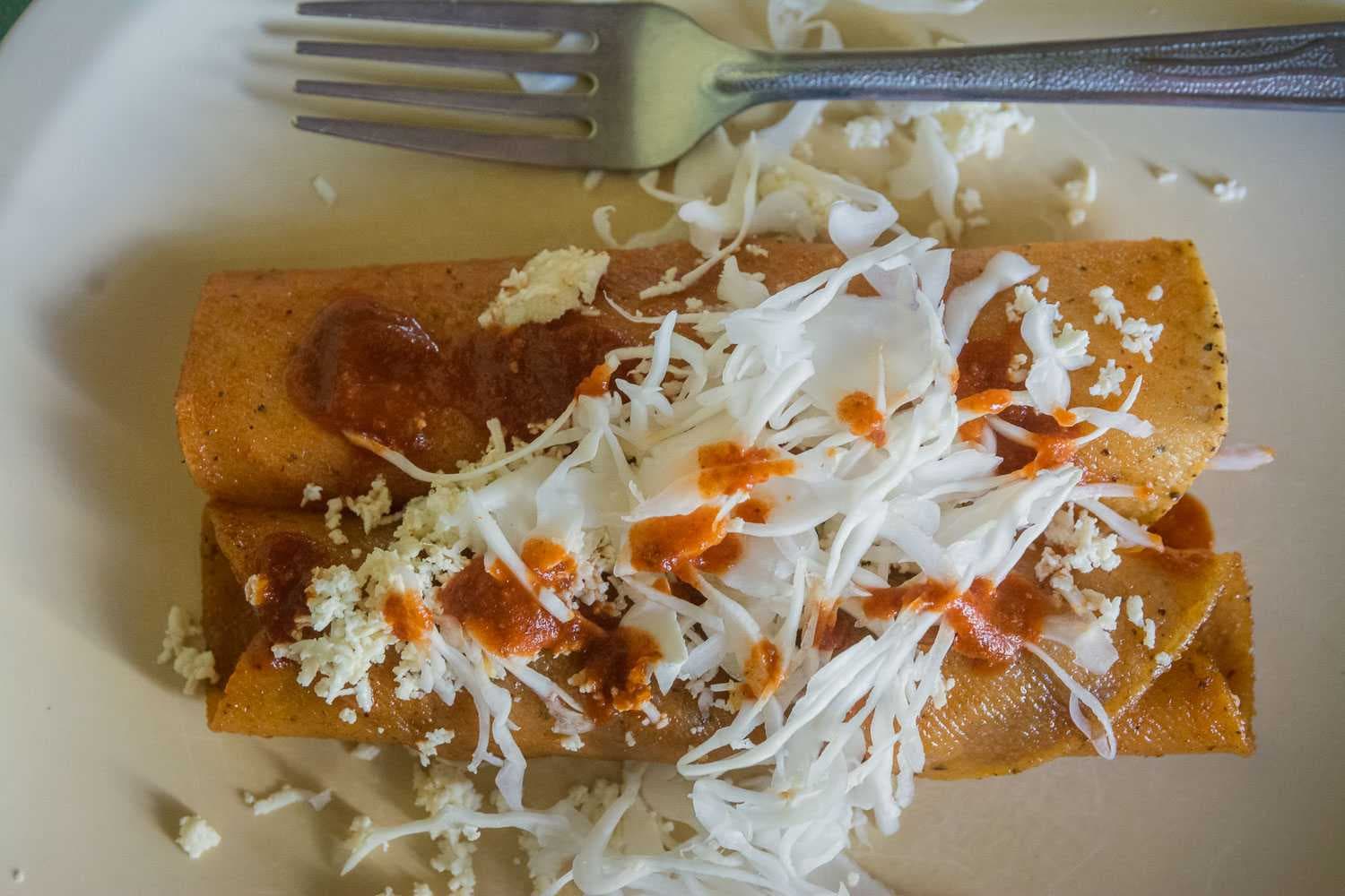 Enchiladas with pork. Found at Cenaduría Memo.