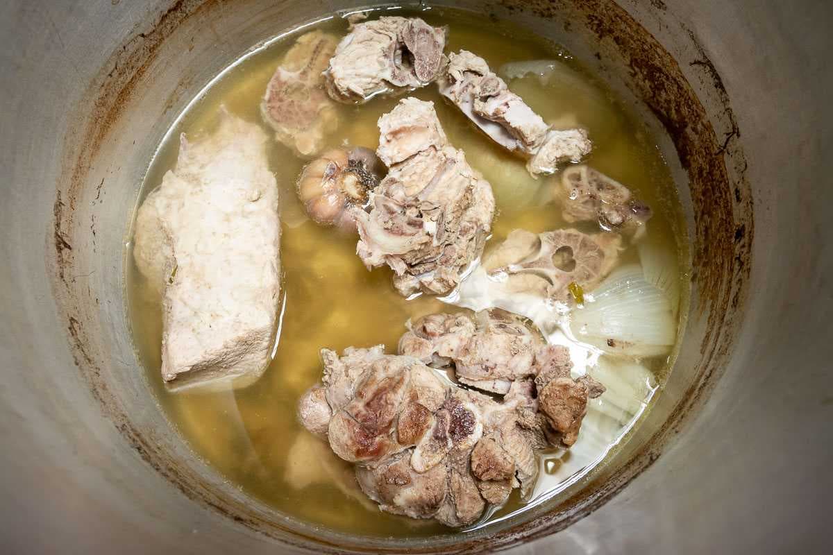Pork leg, spine and skin are a few of the common cuts of pork used in pozole.